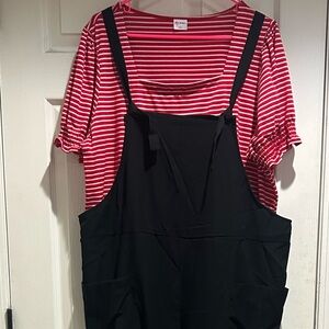 Black, oversized bib jumper. Never worn.